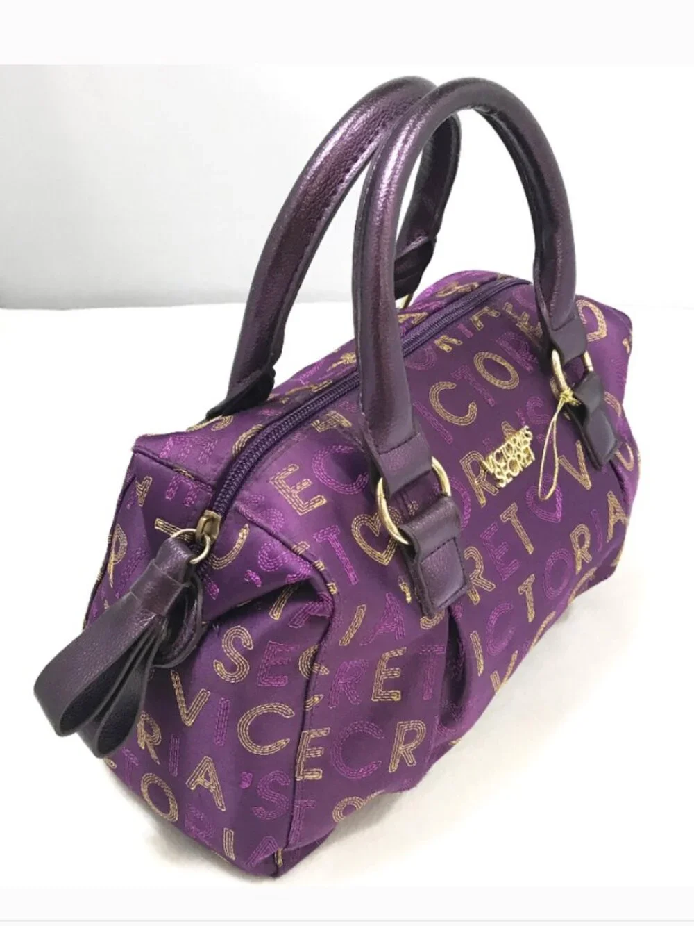 New Victoria's Secret gold/purple embroidered handbag